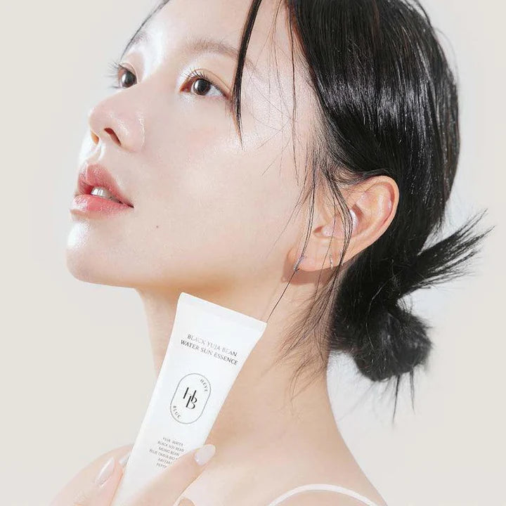 HEVEBLUE – Essence solaire hydratante au haricot noir et yuja - 50 ml