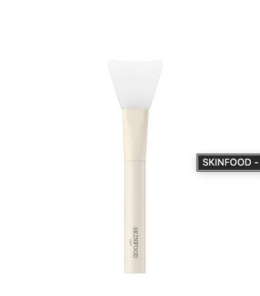 SKINFOOD, Brosse en silicone, Nettoyage de la peau, Brosse de nettoyage, Soin du visage, Exfoliation douce, Peau lisse, Soin purifiant, Accessoire de beauté, Nettoyage en profondeur, Douceur, Routine de soins, Soin doux, Peau rafraîchie, Accessoire de soin